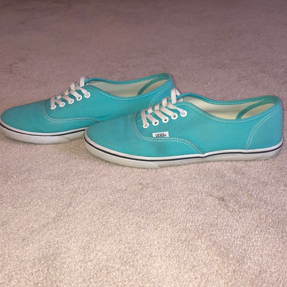 Teal colored vans!